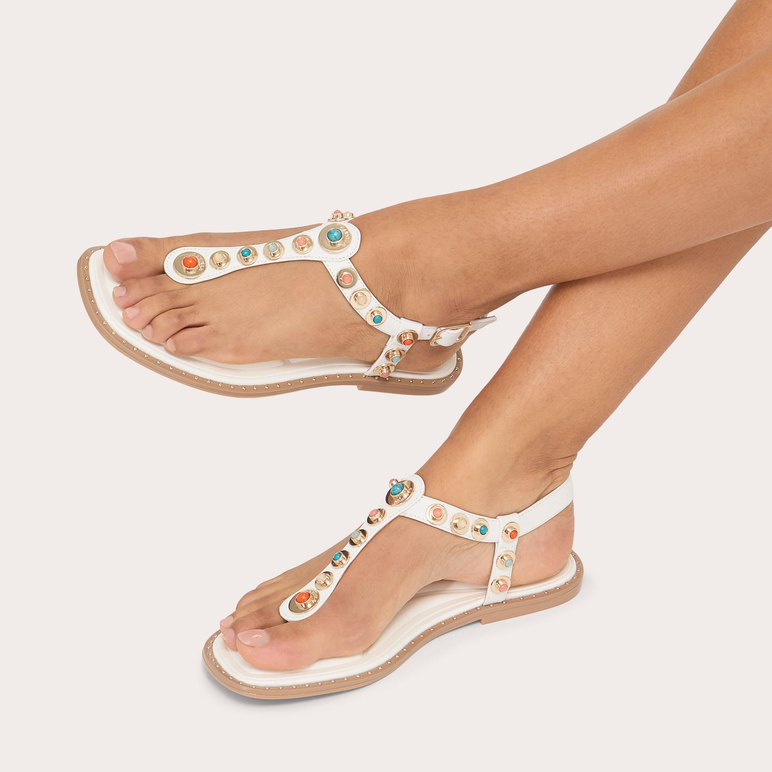 Amalfi T-Bar — White Leather Stone Sandal, worn on foot