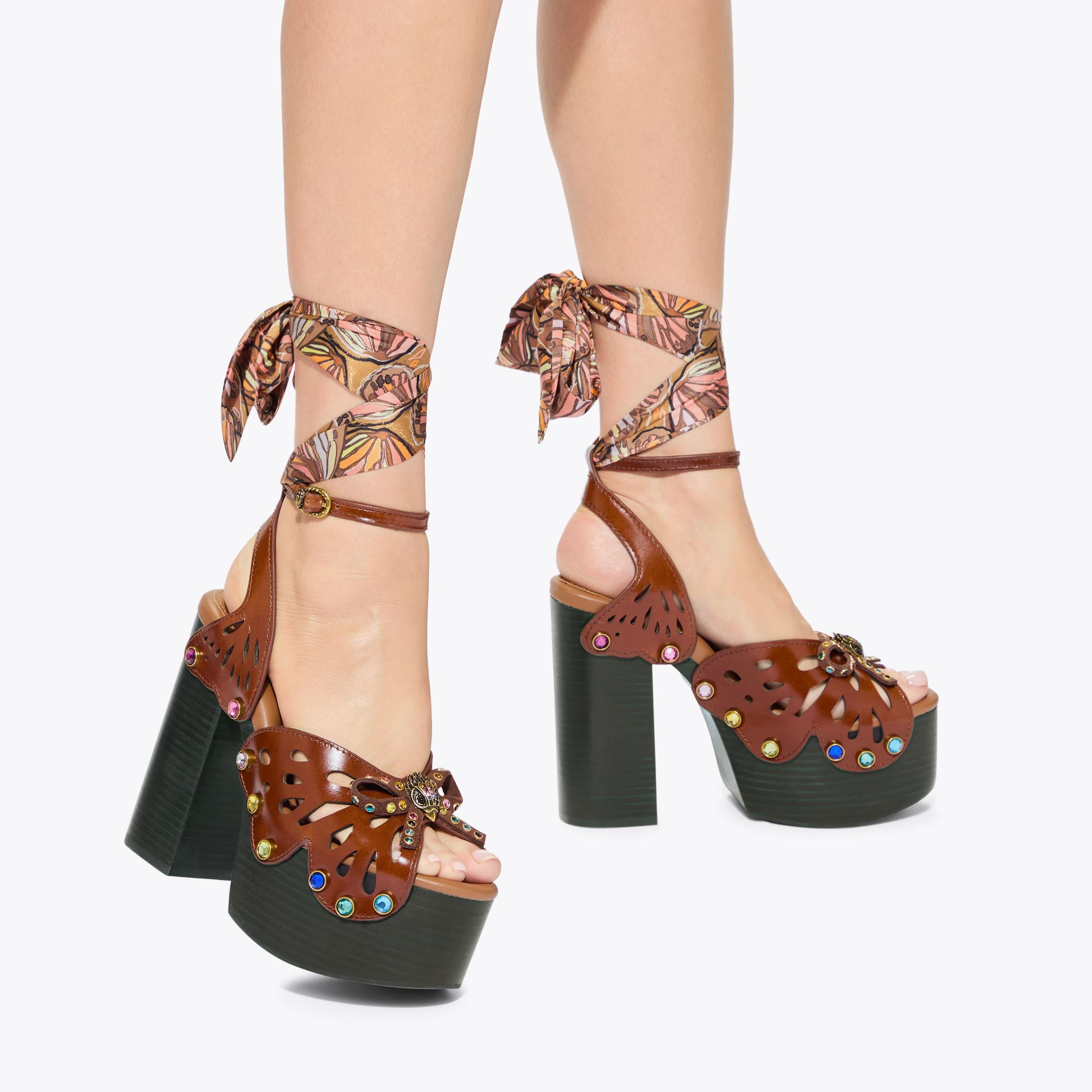 Butterfly Platform Heel — Dark Brown Leather Crystal Sandal, worn on foot