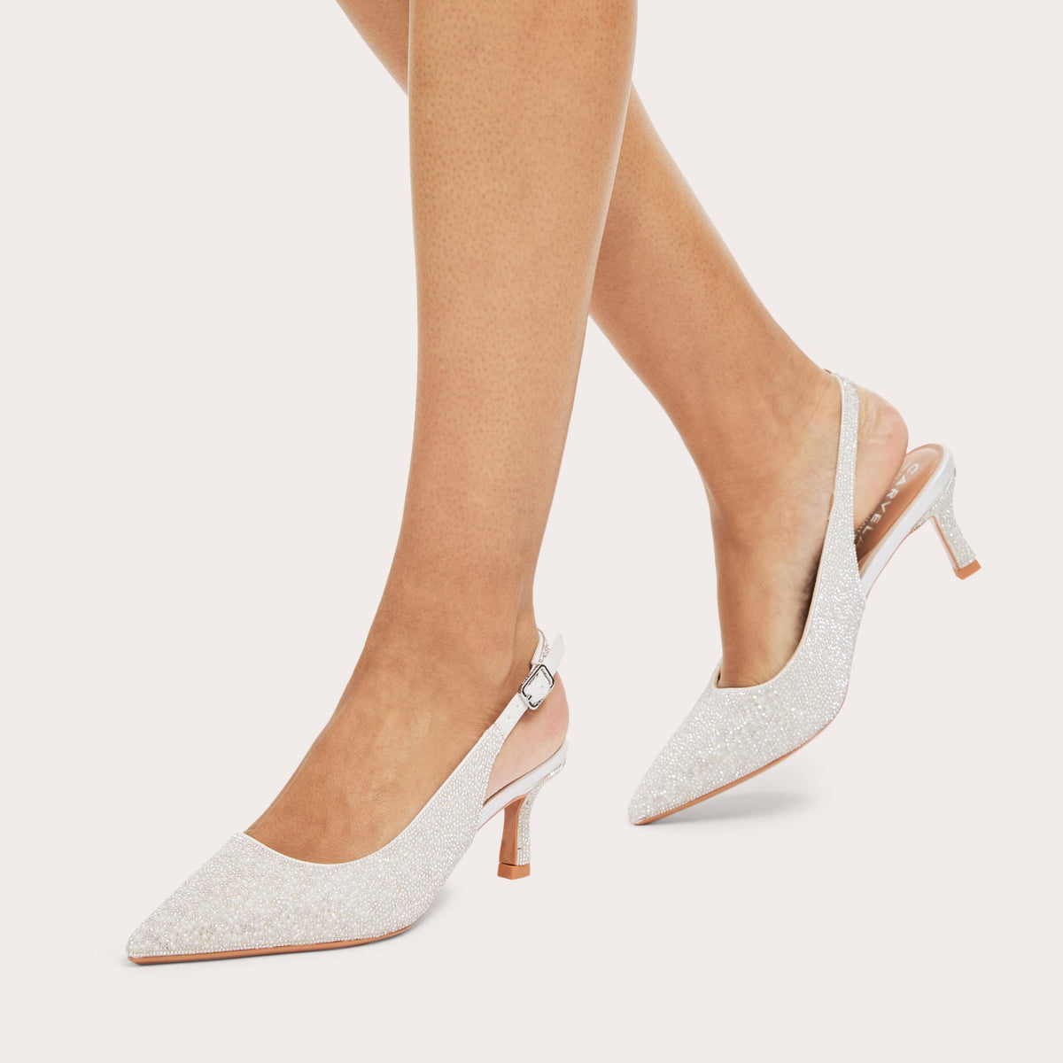 Corletta Sling Back Low Heel — White Pearl and Crystal Court, worn on foot
