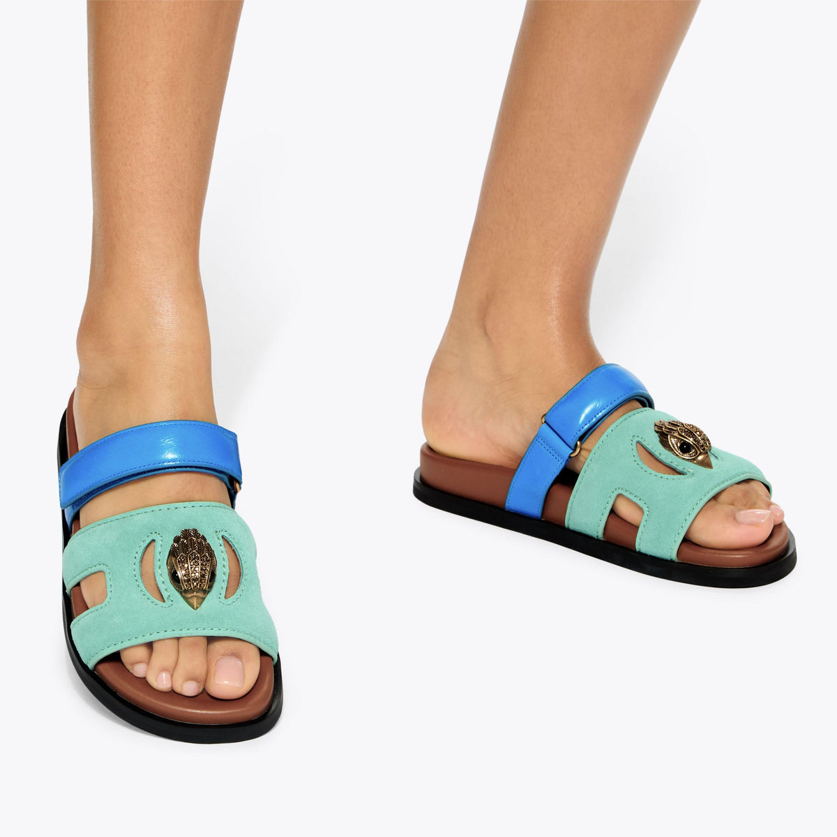 Eagle Cut Out Sandal — Pale Green Suede Slide, worn on foot
