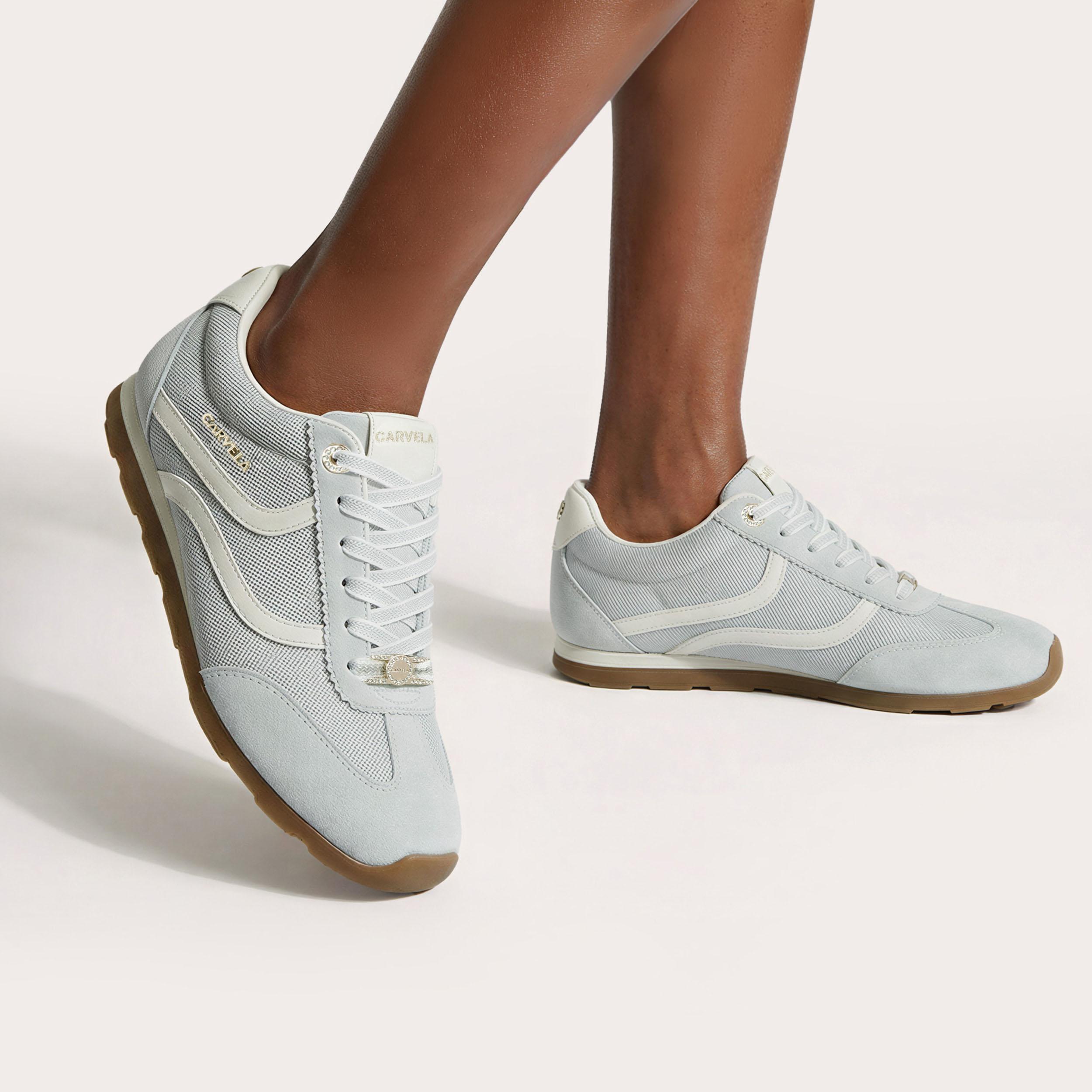Florence — Pale Blue Trainer, worn on foot