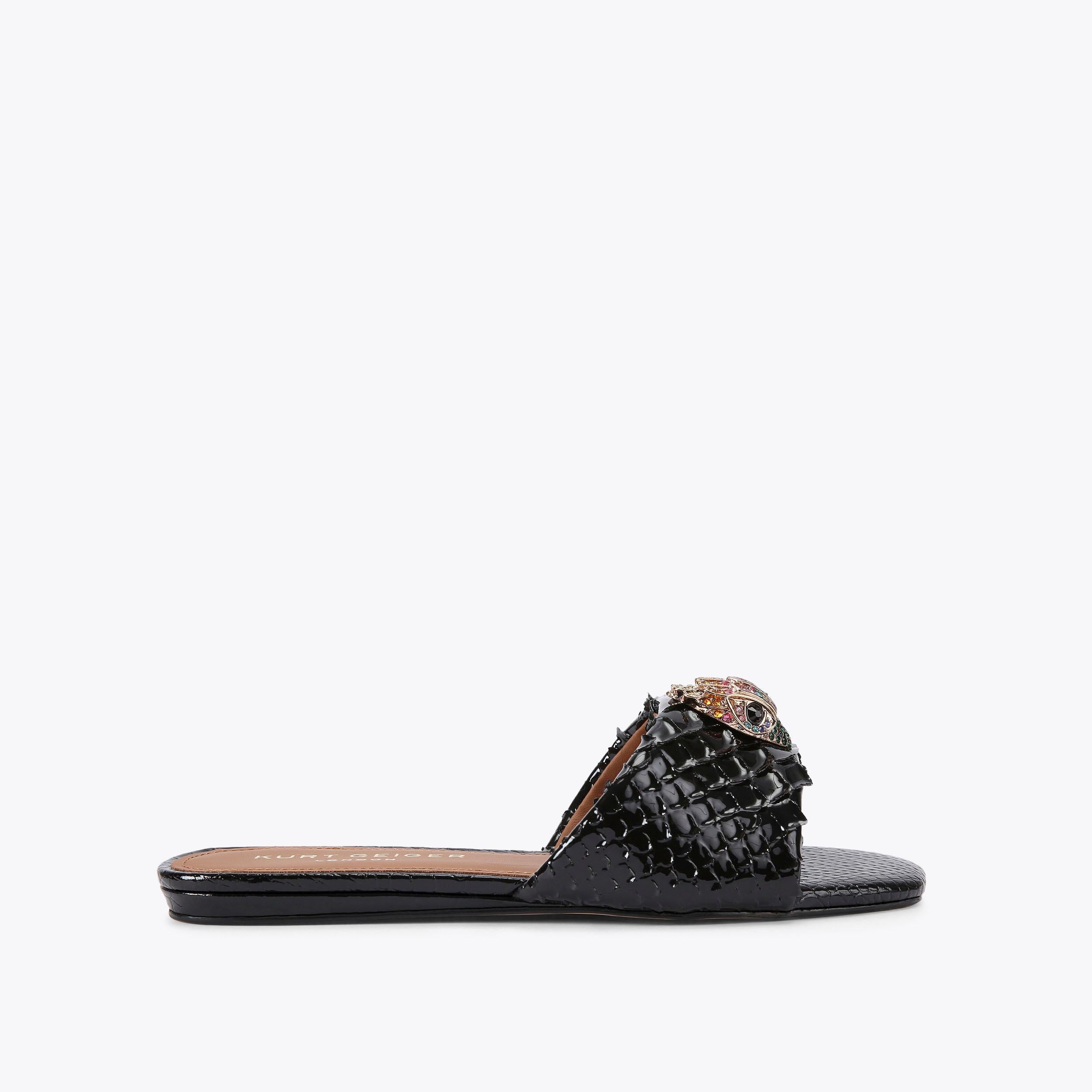 Kensington Flat Sandal — Black Lizard-Embossed Leather Slide, side profile