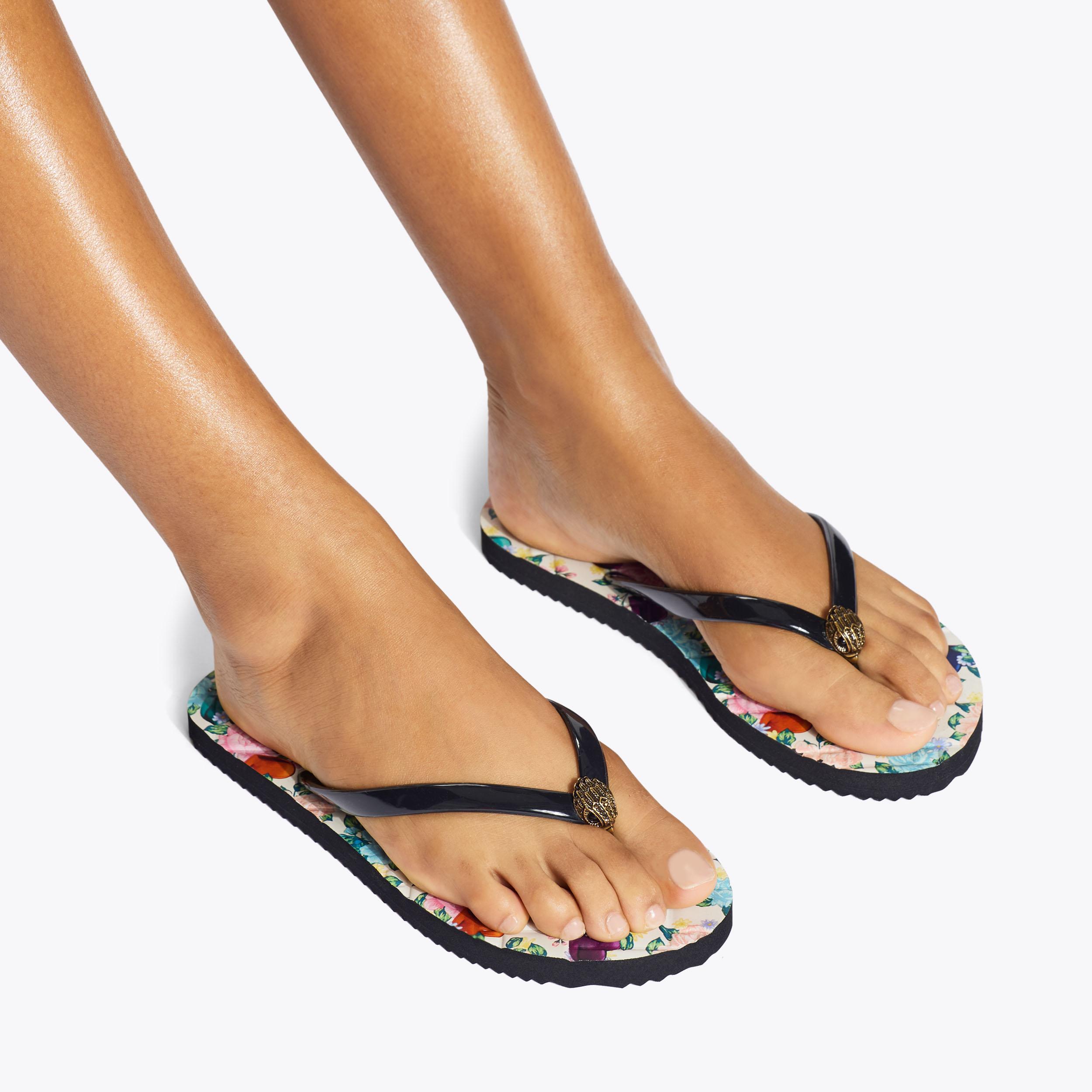 Kensington — Black Combination Flip Flop, worn on foot