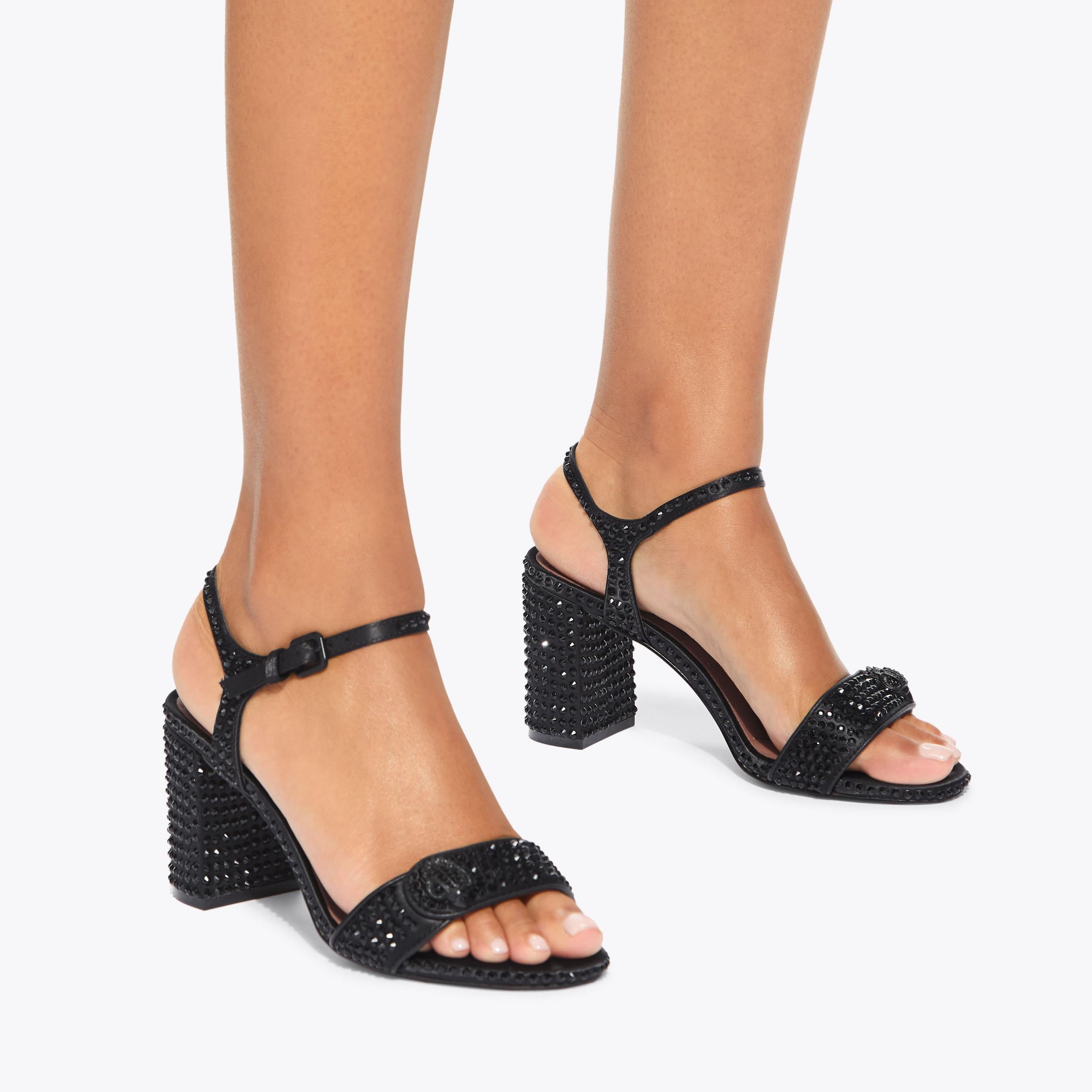 Kensington Langley — Black Raffia Sandal, worn on foot