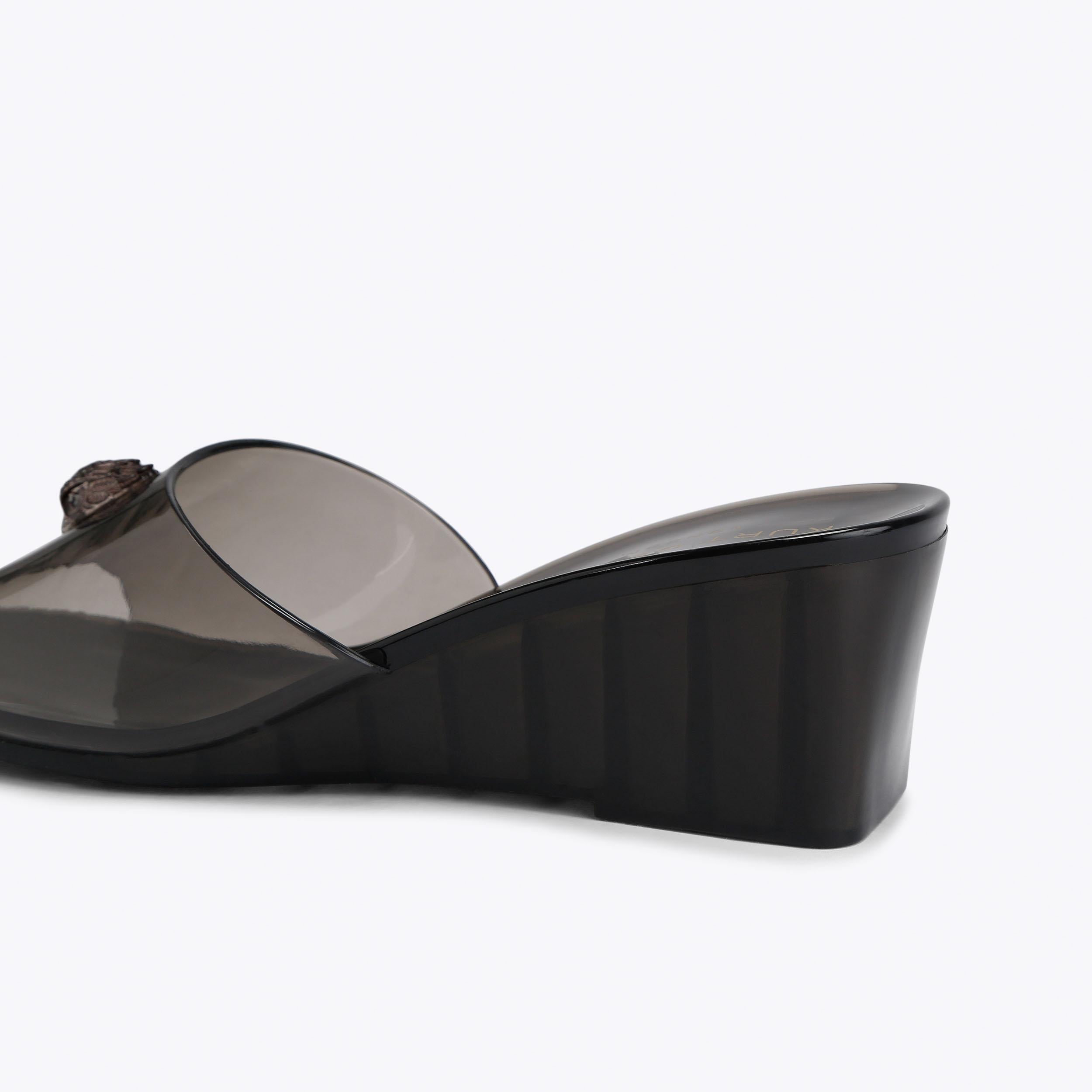 Maddison Wedge Mule — Black Transparent Sandal, detail