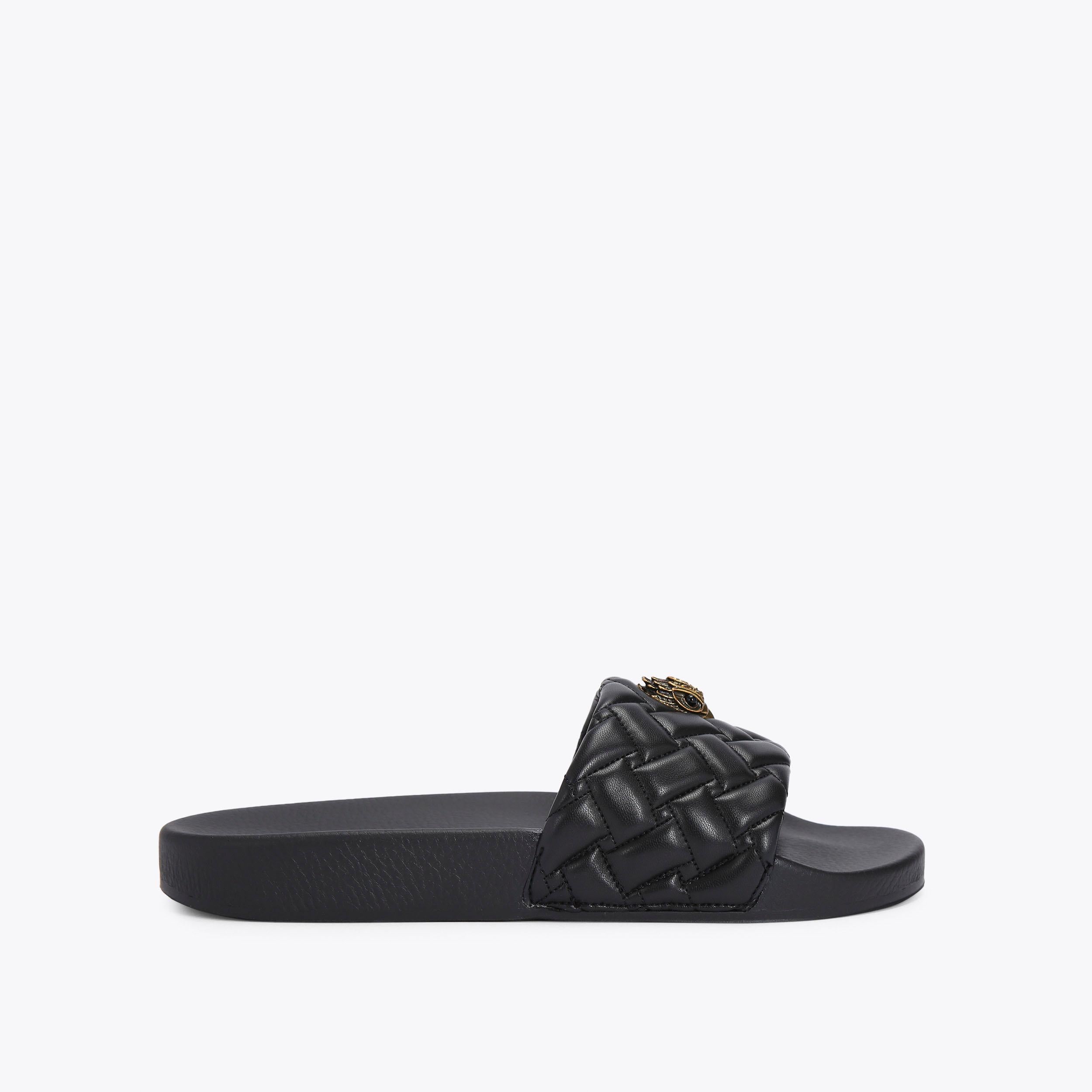 Meena Eagle — Black Quilted Slide, side profile