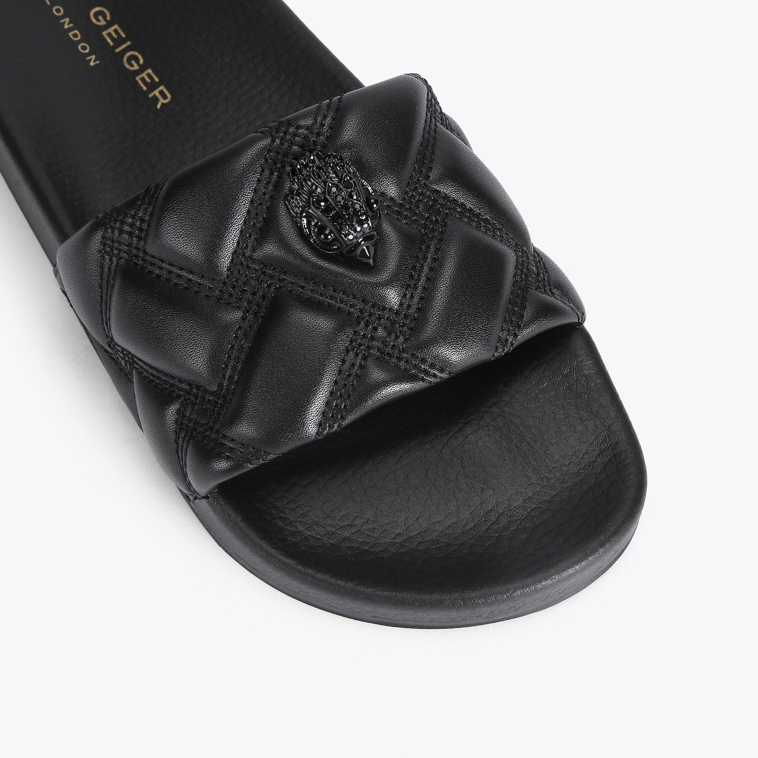 Meena Eagle — Black Quilted Slide, detail