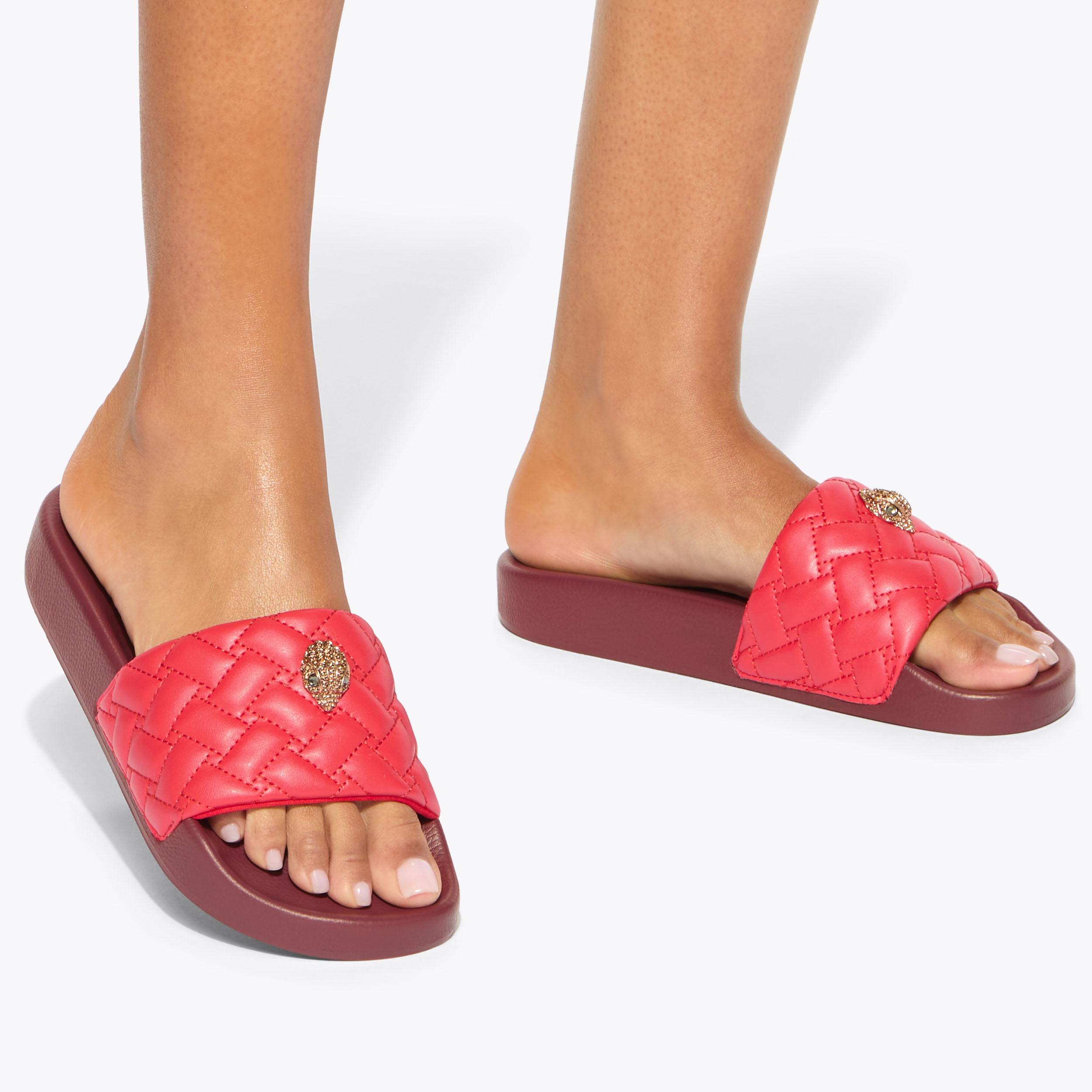 Meena Eagle — Red Quilted Leather Slide, worn on foot