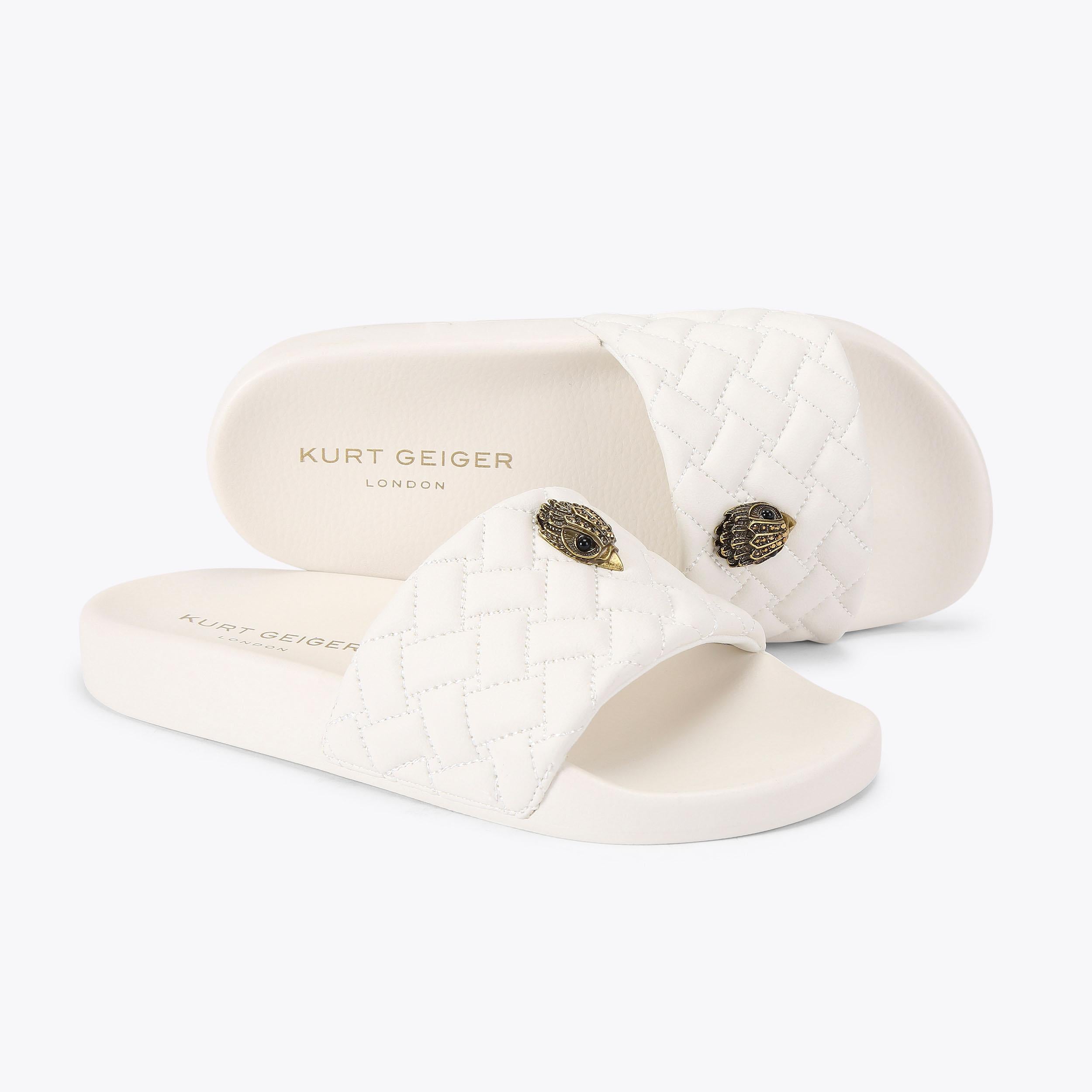Meena Eagle — White Quilted Slide, detail