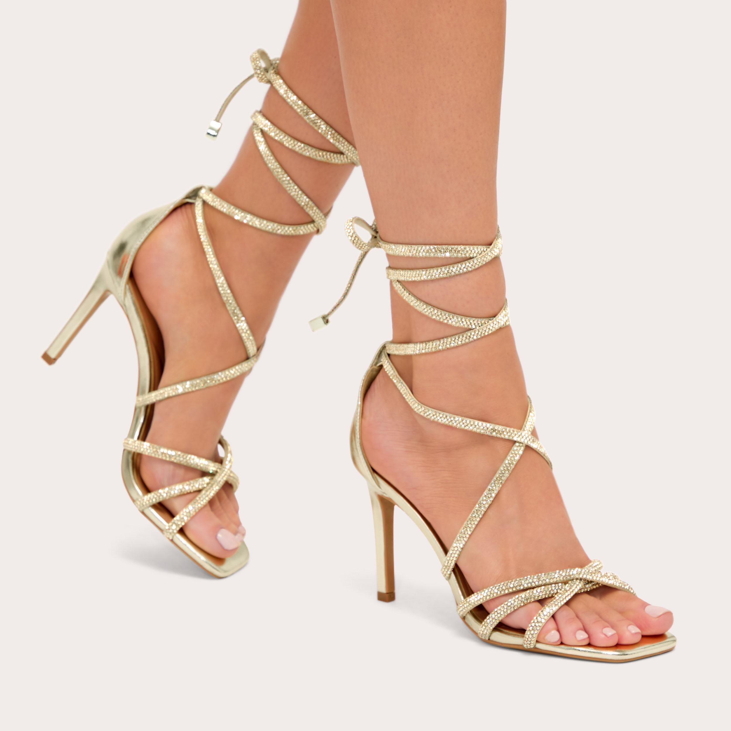 Paparazzi Tie — Gold Crystal Heel, worn on foot