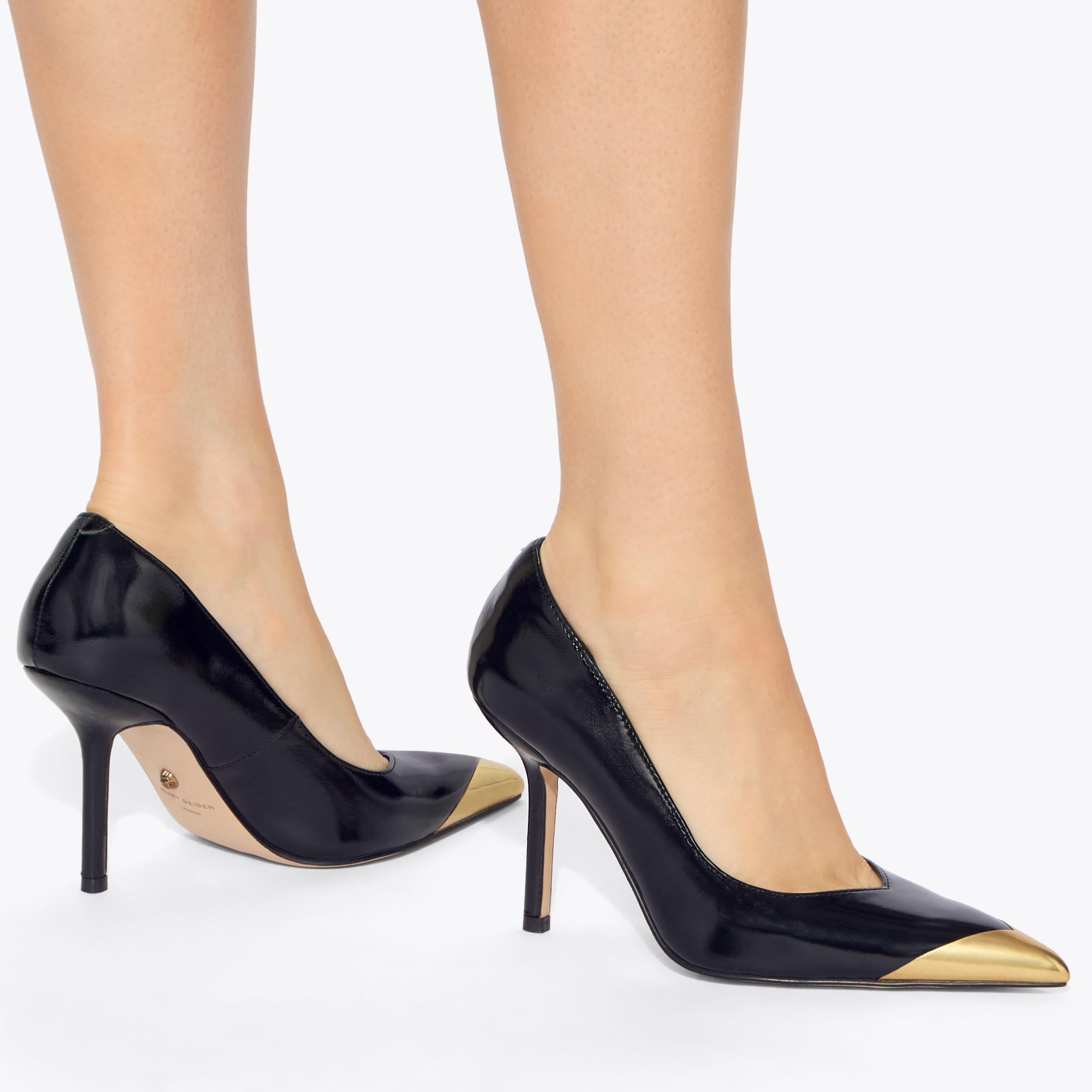 Regent Point Court — Black Patent Court Heel, worn on foot