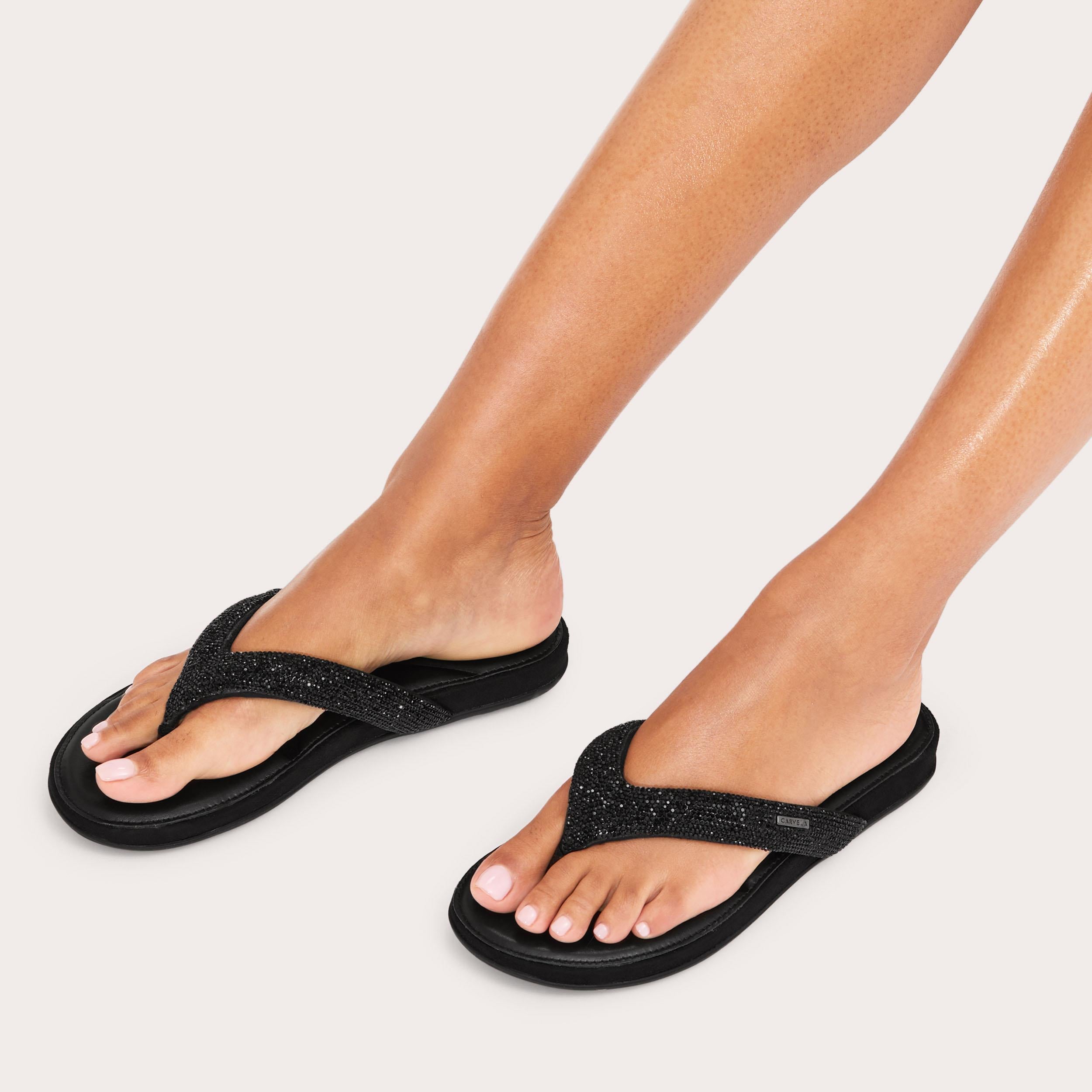 Riviera Jewel — Black Crystal Toe-Post Sandal, worn on foot