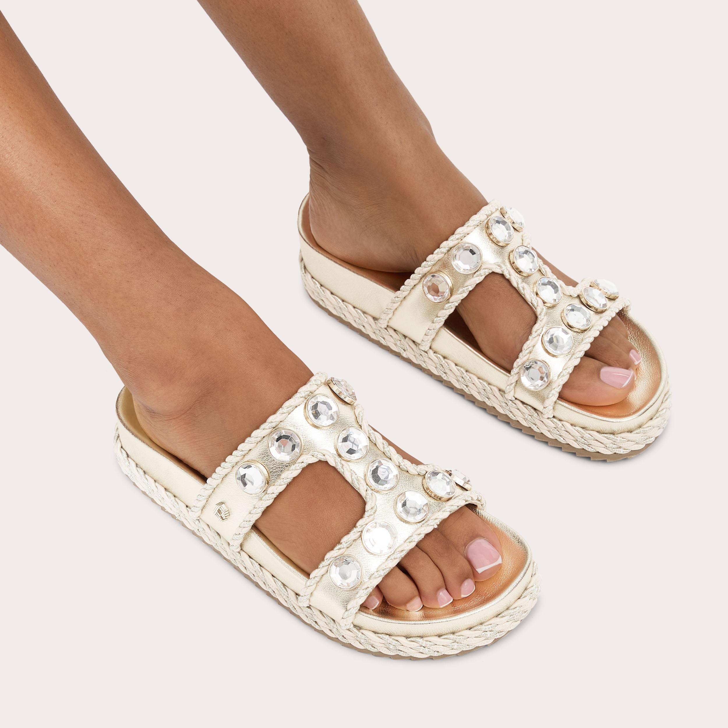 Sorella Flatform — Metallic Gold Crystal Sandal, worn on foot