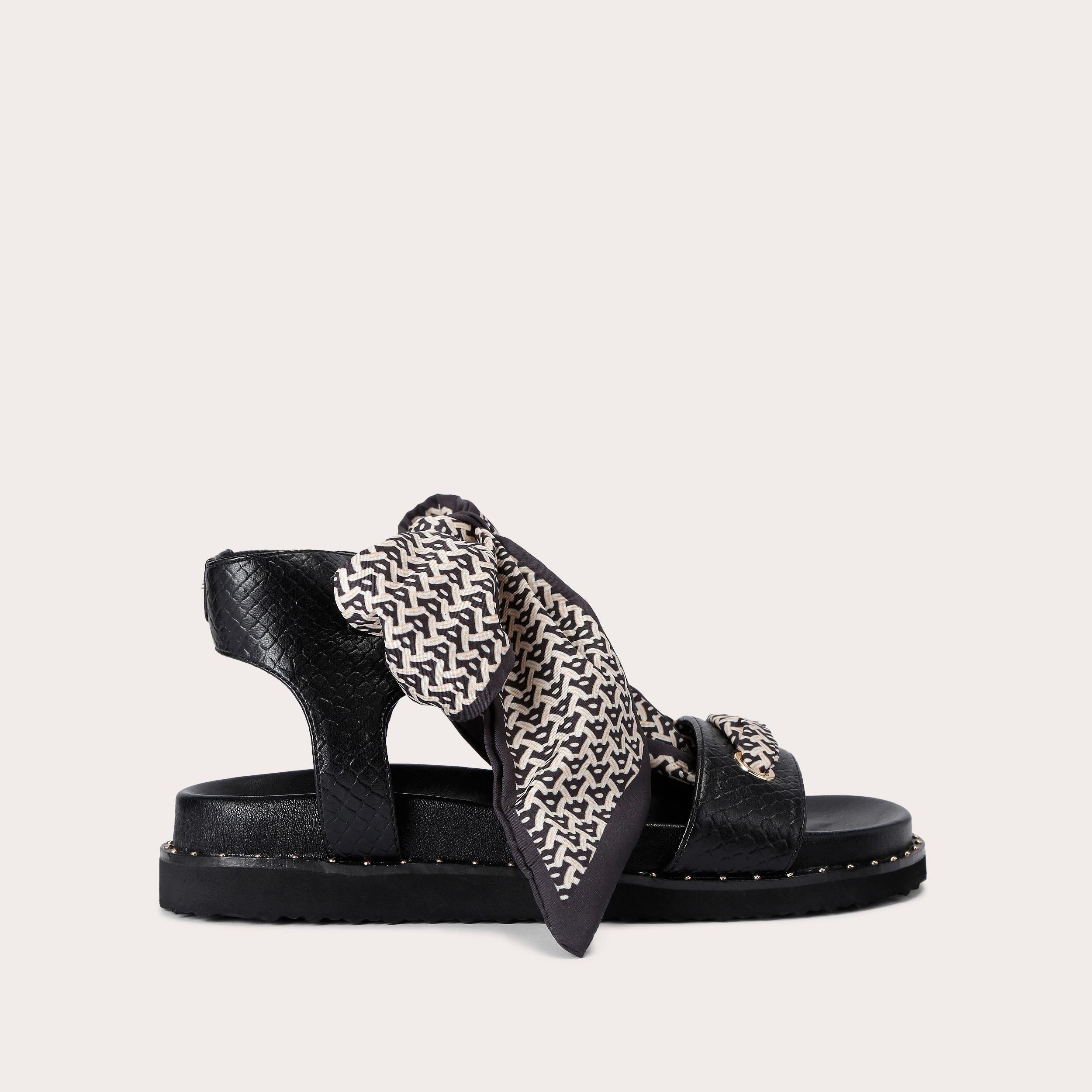 Sorrento Scarf Sandal — Black Lizard-Effect Sandal, worn on foot