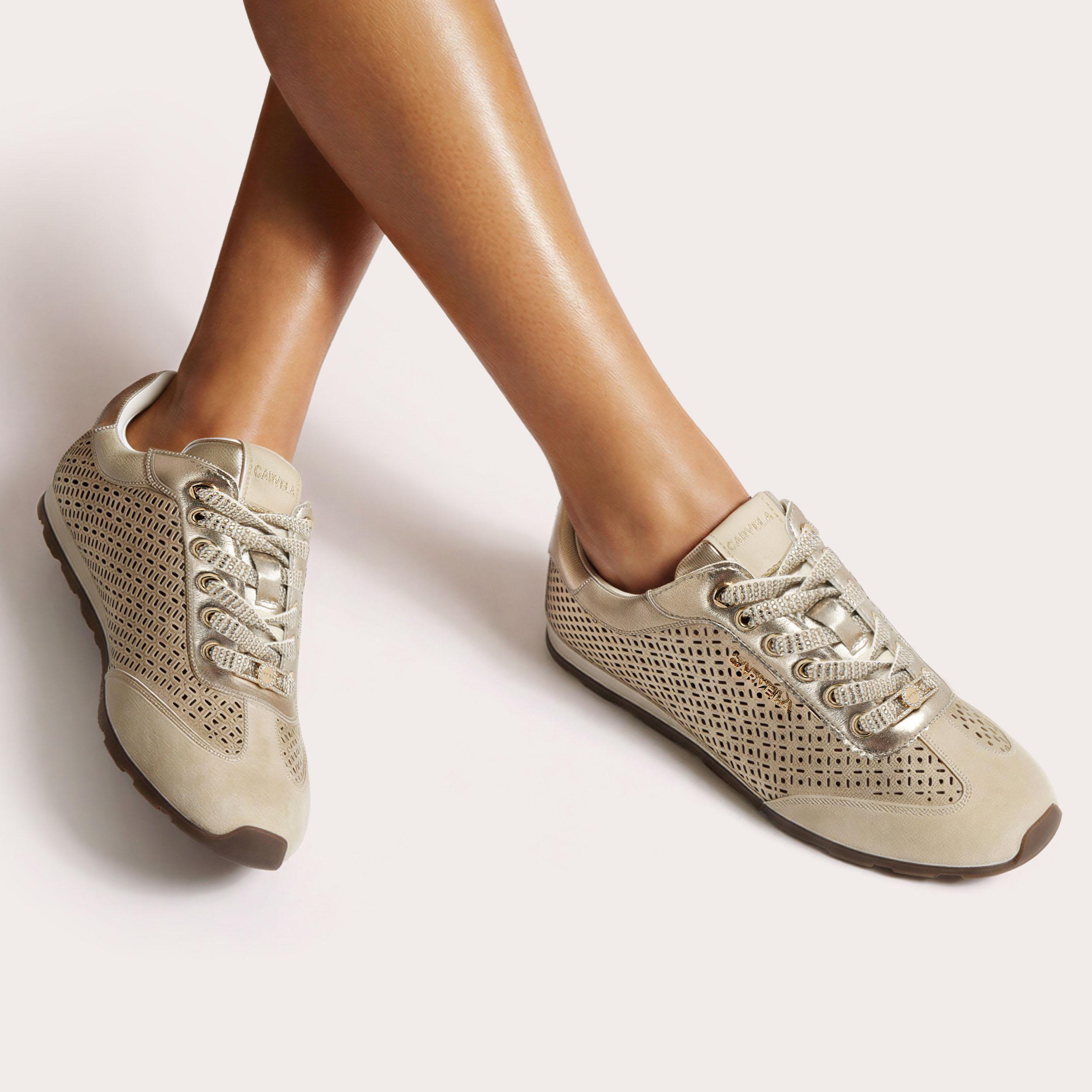 Tivoli Laser — Gold Trainer, worn on foot