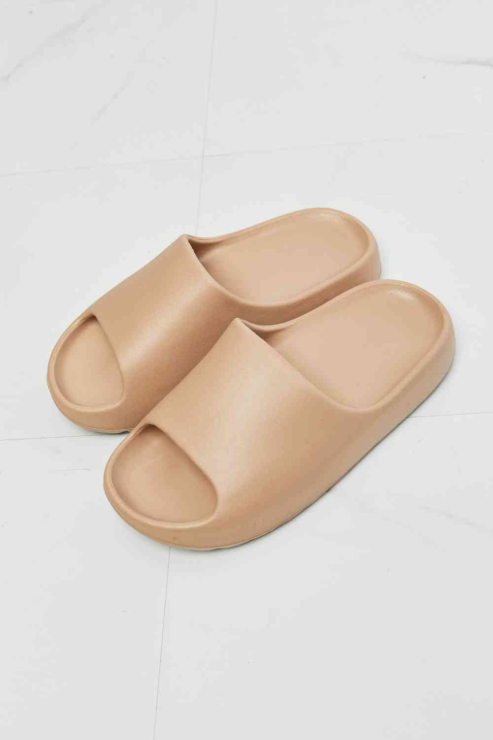 Beige best sale rubber slides